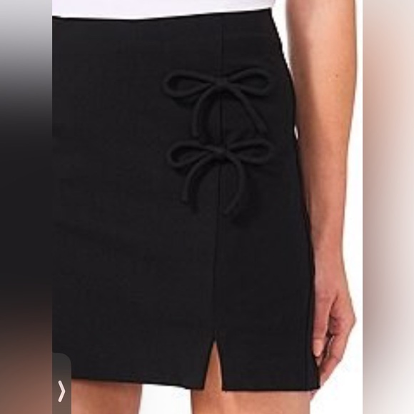 CECE Bow Mini Skirt - Picture 2 of 10